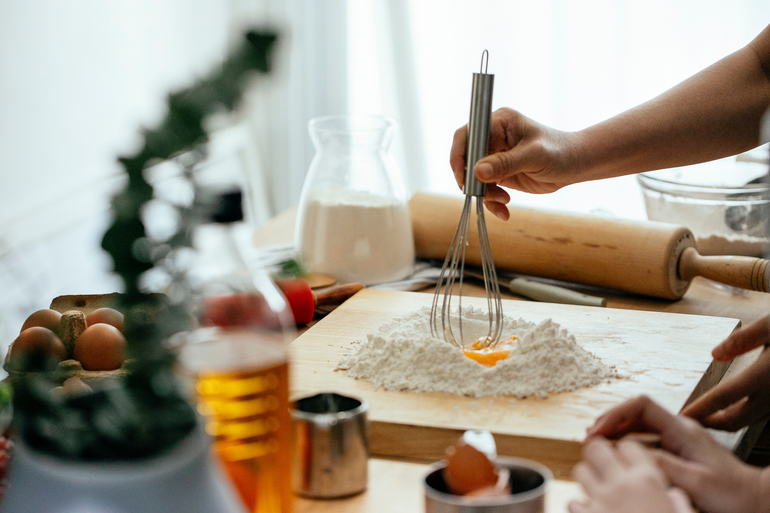 Anonymous women cooking together in kitchen